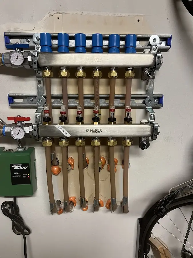 Plumber performing Gas Line Installation at a residential property in Edison